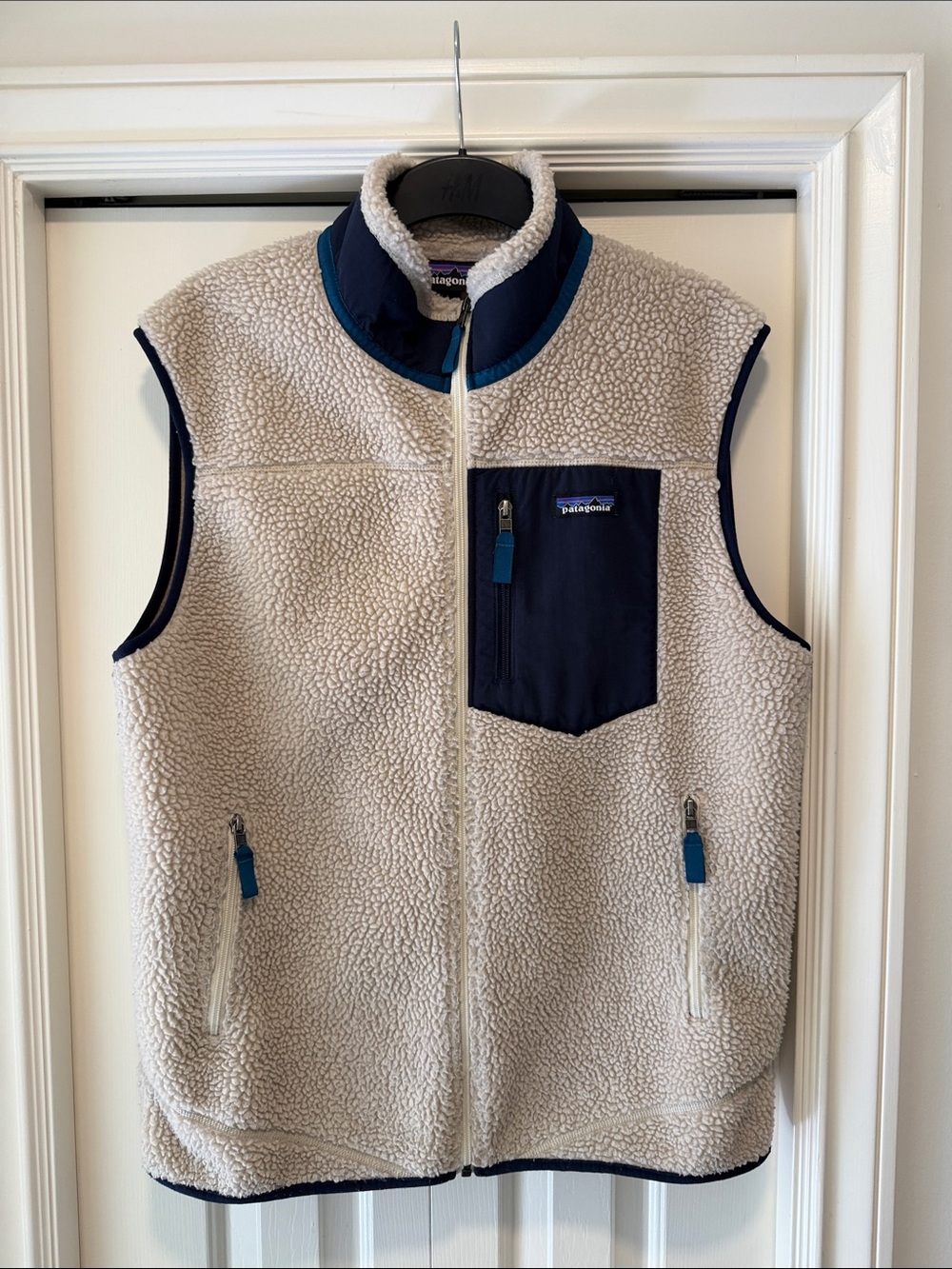 Patagonia Men’s Cream Sherpa Vest with Navy Pocket and Trim